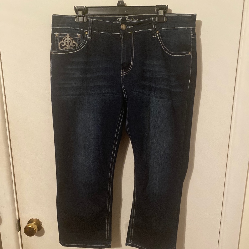 Two pairs of capris, and one top
